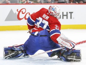 Canadiens goalie Antti Niemi twists his body to make a save against the Panthers Monday night at the Bell Centre.