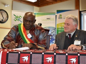 Sikasso regional councillor Fousseni Dembele, pictured left, with Rigaud Mayor Hans Gruenwald Jr.