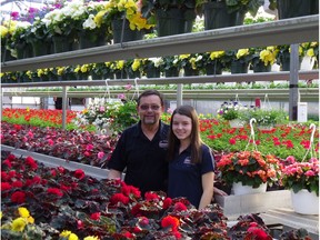 John Van Egmond and Lisa Van Egmond in their St-Lazare greenhouse.