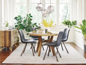 Carpet- and rug-buying pro tip: The area-rug size takes its cue from the size of the dining table, not the room.