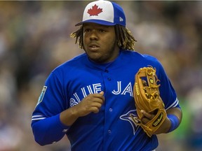 Toronto Blue Jays 3rd base Vladimir Guerrero Jr. leaves the field against the St. Louis Cardinals during MLB pre-season game in Montreal, on Monday, March 26, 2018.