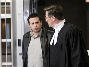 Charalabos Nassios is seen with his lawyer, Tom Pentefountas, as he leaves Montreal courthouse on Tuesday, March 27, 2018.