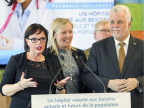Soulanges MNA Lucie Charlebois (left), Vaudreuil MNA Marie-Claude Nichols, Health Minister Gaetan Barrette and Quebec Premier Philippe Couillard announce details of a new hospital to be built in Vaudreuil-Dorion at a press conference held March 22, 2018.