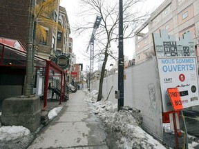 Businesses and apartments on Bishop St. have been cut off from the street by a years-long construction project.