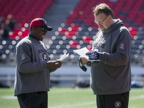Miles Gorrell, right, and receivers coach Travis Moore at the Ottawa Redblacks' open tryouts on April 23, 2016 in Ottawa.