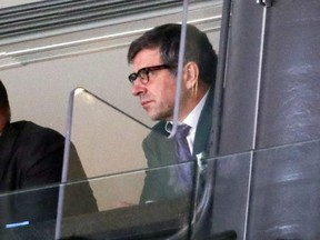 Canadiens general manager Marc Bergevin watches his team compete against the Los Angeles Kings during NHL game at the Bell Centre in Montreal on Oct. 26, 2017.