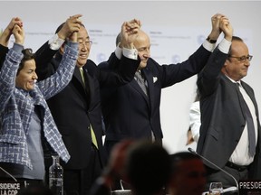 Political leaders celebrate the adopting of a historic global warming pact at the COP21 Climate Conference in Le Bourget, north of Paris, on December 12, 2015. These Paris pledges are dangerously insufficient, Daniel Horen Greenford and Corey Lesk write, and author and intellectual Steven Pinker is wrong to expect technological fixes to be able mitigate the shortfall, they say.