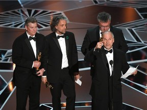 Visual effects artists Richard R. Hoover, Paul Lambert, Gerd Nefzer, and John Nelson accept Best Visual Effects for 'Blade Runner 2049' onstage during the 90th Annual Academy Awards at the Dolby Theatre at Hollywood & Highland Center on March 4, 2018 in Hollywood, California.