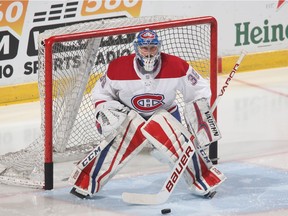 Canadiens goalie Charlie Lindgren gets ready for shot during pre-game warmup in Florida on March 8, 2018 before facing the Panthers.