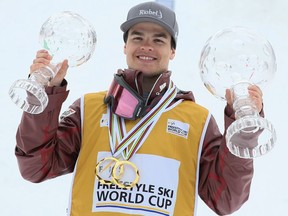 Mikael Kingsbury of Canada wins the globe in the overall standings during the FIS Freestyle Ski World Cup Men's and Women's Moguls Finals on March 18, 2018 in Megeve, France.