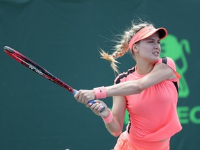 Westmount's Eugenie Bouchard plays a shot against U.S. wild-card Allie Kiick during Day 1 of the Miami Open in Key Biscayne, Fla.