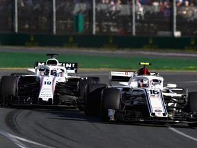 MELBOURNE, AUSTRALIA - MARCH 25: Charles Leclerc of Monaco driving the (16) Alfa Romeo Sauber F1 Team C37 Ferrari leads Lance Stroll of Canada driving the (18) Williams Martini Racing FW41 Mercedes on track during the Australian Formula One Grand Prix at Albert Park on March 25, 2018 in Melbourne, Australia.