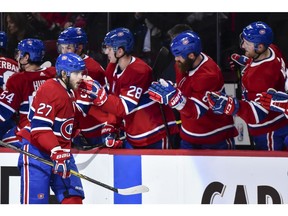 Canadiens' Alex Galchenyuk celebrates his third-period goal with teammates on the bench against the Detroit Red Wings at the Bell Centre on Tuesday, March 26, 2018, in Montreal. Over the course of a season marked by injuries and disappointing performances, there are a number of players who have shown grit.