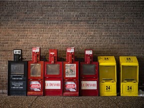 MONTREAL, QUE.: MARCH 7, 2016 -- Mostly empty newspaper vending machines including boxes for The Globe and Mail, Journal de Montreal, Le Devoir, and 24 Heures outside the Universite de Montreal in Montreal on Monday, March 7, 2016.