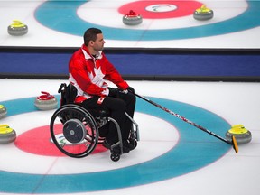 Canada's Mark Ideson competes in the wheelchair curling round robin session at the Gangneung Curling Centre during the Pyeongchang 2018 Winter Paralympic Games in Gangneung on March 15, 2018.