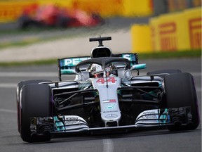 TOPSHOT - Mercedes' British driver Lewis Hamilton drives around the Albert Park circuit during the Formula One qualifying session in Melbourne on March 24, 2018, ahead of the Formula One Australian Grand Prix.