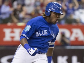Toronto Blue Jays' Vladimir Guerrero Jr. celebrates his walk-off homerun to defeat the St. Louis Cardinals 1-0 during ninth inning spring training baseball action Tuesday, March 27, 2018 in Montreal.