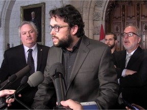 In this framegrab from video, Bloc Quebecois MP Gabriel Ste-Marie announces he is quitting the party caucus in Ottawa, Wednesday, Feb. 28, 2018.