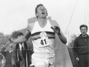 In this May 6, 1954 file photo, Britain's Roger Bannister hits the tape to break the four-minute mile in Oxford, England. A statement released Sunday March 4, 2018, on behalf of Bannister's family said Sir Roger Bannister died peacefully in Oxford on March 3, aged 88.