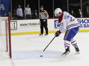 Canadiens' Alex Galchenyuk scores the third and, by far, the easiest of his three goals into an empty net Friday night in New York.