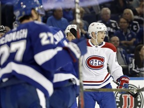 Montreal Canadiens left wing Artturi Lehkonen, right, of Finland, celebrates his goal against the Tampa Bay Lightning during the first period of an NHL hockey game Saturday, March 10, 2018, in Tampa, Fla.