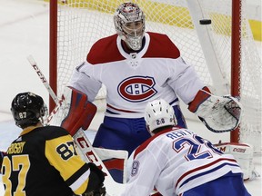 Canadiens goaltender Carey Price watches a shot by Penguins' Sidney Crosby go wide of the net Wednesday night in Pittsburgh.
