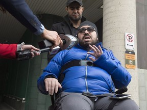 Aymen Derbali reacts to the guilty plea by Alexandre Bissonnette for the 2017 mosque shooting, Wednesday, March 28, 2018 at the courthouse in Quebec City.