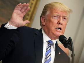 President Donald Trump speaks before signing the 'Section 232 Proclamations' on steel and aluminum tariffs in the White House on March 8, 2018