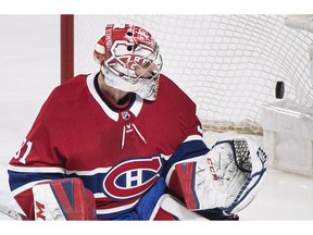 Canadiens goaltender Carey Price is scored on by Washington Capitals' Tom Wilson during first period NHL hockey action in Montreal on Saturday, March 24, 2018.