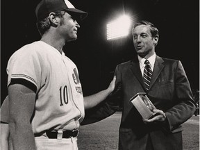 Canadiens great Jean Béliveau meets with Expos star Rusty Staub at Jarry Park on April 9, 1971, the night Béliveau retired from hockey.