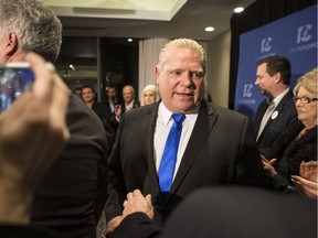Doug Ford leaves a press conference after being named as the newly elected leader of the Ontario Progressive Conservatives at the delayed Ontario PC Leadership announcement in Markham, Ont., on Saturday, March 10, 2018.