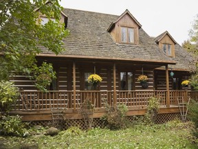 Pierre Giguère built this pièce-sur-pièce log home from a prefab kit with the help of his three brothers in 1985.