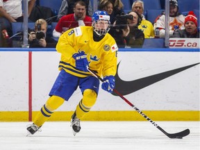 In this Dec. 31, 2017 file photo, Sweden's Rasmus Dahlin skates during the second period of an IIHF world junior hockey championships game against Russia in Buffalo, N.Y.  All eyes are on the dynamic, smooth-skating, offensively gifted 17-year-old defenceman, with the entire hockey community aware that he's almost a lock to be the No. 1 pick in the NHL draft this June.