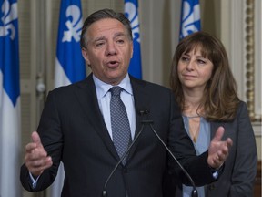 Nathalie Roy, the minister responsible for French, with Premier François Legault. Roy wants stricter enforcement of Bill 101’s rules on the language of commercial signs.