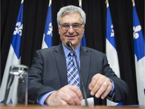 Quebec government legislature leader Jean-Marc Fournier announces he will not seek re-election this fall, during a news conference Monday, March 5, 2018 at the legislature in Quebec City.