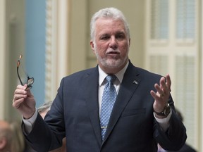 Quebec Premier Philippe Couillard responds to the Opposition during question period in the National Assembly, in Quebec City on Wednesday, March 14, 2018.