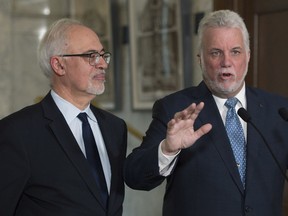 Do West Islanders want four more years of a Quebec Liberal government led by Philippe Couillard? The premier (right) is pictured here with Robert-Baldwin MNA and Finance Minister Carlos Leitão.