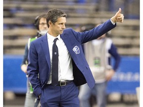 Montreal Impact Head Coach Remi Garde signals during second half MLS action against the Toronto FC, in Montreal on Saturday, March 17, 2018.