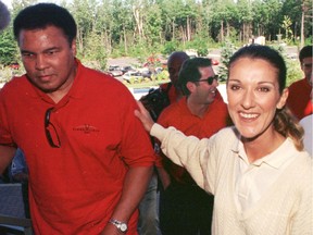 Muhammad Ali and Celine Dion, with Yank Barry in the background. Photo was taken during Ali's visit to Dion's golf course in Terrebonne on Aug. 17, 1997.