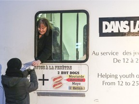 The Dans la rue motorhome serves warm meals to young homeless people in Montreal.