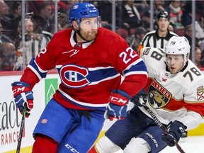 Montreal Canadiens defenceman Karl Alzner skates away from Florida Panthers' Maxim Mamin in Montreal on March 19, 2018.