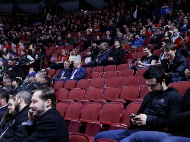 Large sections of seats remain empty as the puck is about to be dropped during NHL action between the Montreal Canadiens and the Winnipeg Jets in Montreal on Tuesday April 3, 2018.