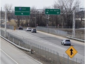 Traffic flows around the Chemin Ste-Marie exit on Highway 40 in Kirkland on Monday.