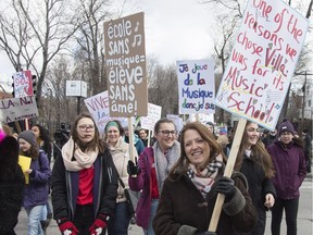 Nathalie Fisette-Caza (R) president of the Parents Association, French students, Villa Maria, takes part in a march protesting against the closure of Villa Maria's 164-year old music school in Montreal, April 7, 2018.