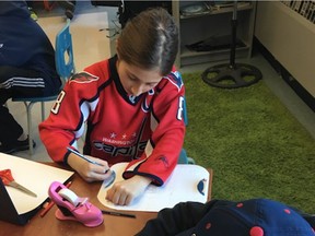 Clearpoint Elementary School students, including Maia Visan, pictured, wrote letters and made posters for the Humboldt bus crash victims.