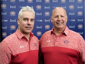 Canadiens head coach Claude Julien, right, introduces Dominique Ducharme as the new assistant coach in Montreal on Friday.