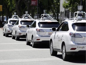 This May 13, 2014 file photo shows a row of Google self-driving Lexus cars at a Google event outside the Computer History Museum in Mountain View, Calif. Our 5G-powered future is likely to include thousands of driverless cars humming throughout the city, François Gratton writes.