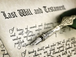 Last Will and Testament document with quill pen and handwriting