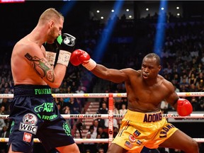 Andrzej Fonfara sidesteps a punch from Adonis Stevenson during their WBC light heavyweight world championship bout at the Bell Centre last June.