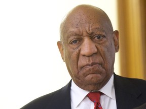 Bill Cosby walks after it was announced a verdict is in at the Montgomery County Courthouse for day fourteen of his sexual assault retrial on April 26, 2018 in Norristown, Pennsylvania.